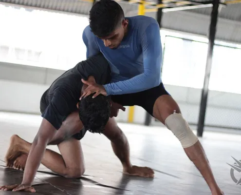 Practicing throws at Core Combat MMA Classes in Chennai